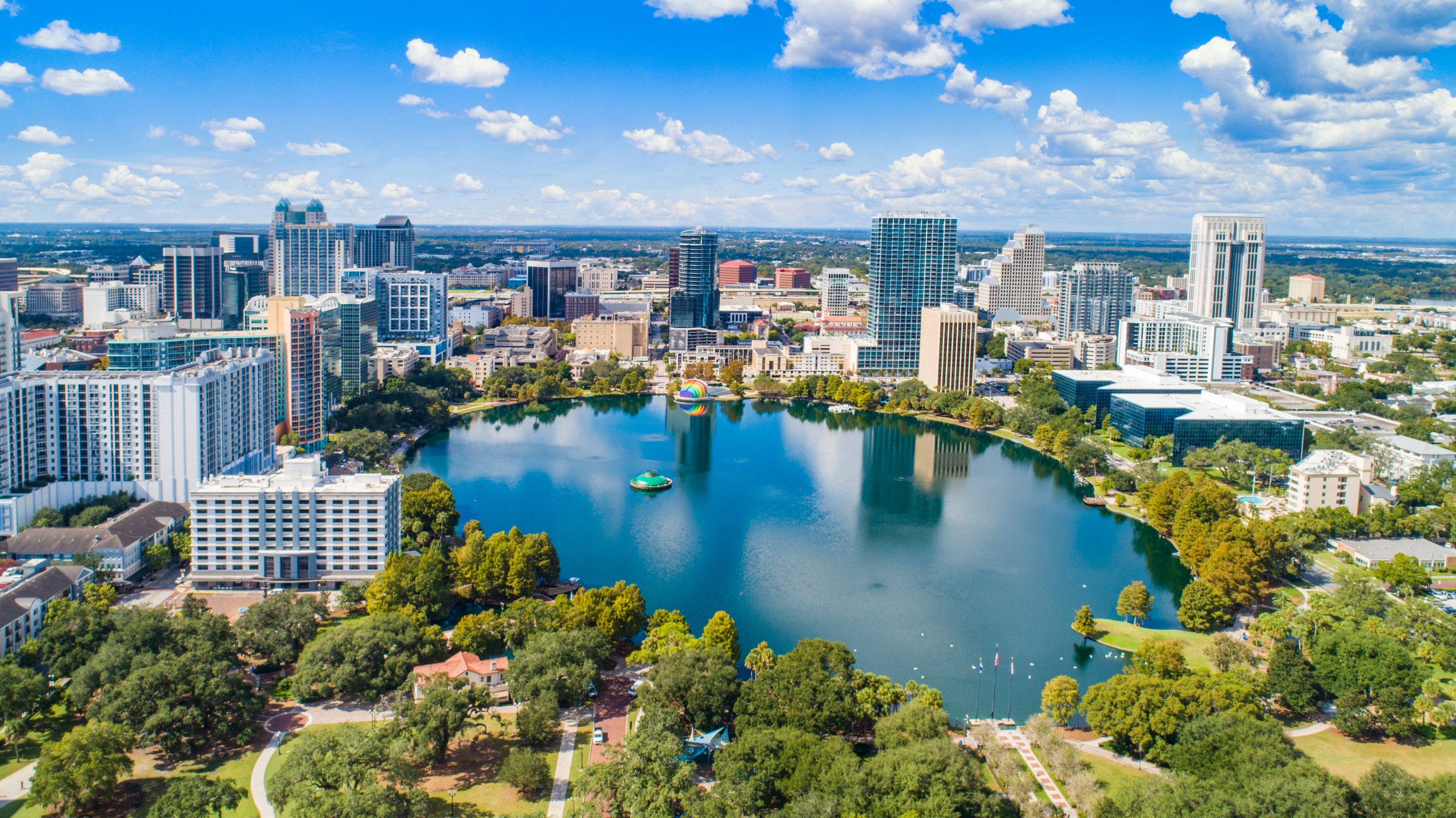 A vibrant conference travel guide showcasing Orlando.